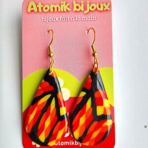 Handmade black, yellow, red and orange polymer clay earrings. Boucles d'oreilles